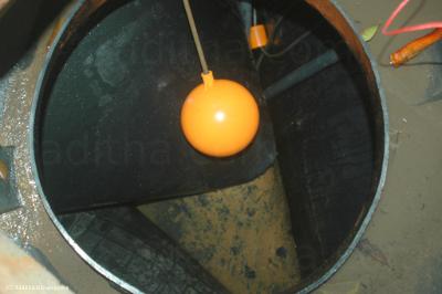 An imploding water tank